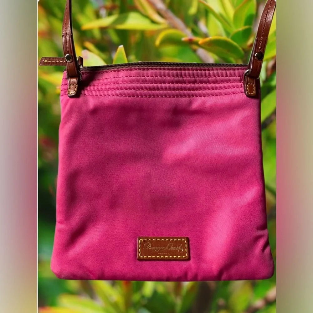 Dooney & Bourke Nylon North South Triple Zip Crossbody in Fuchsia